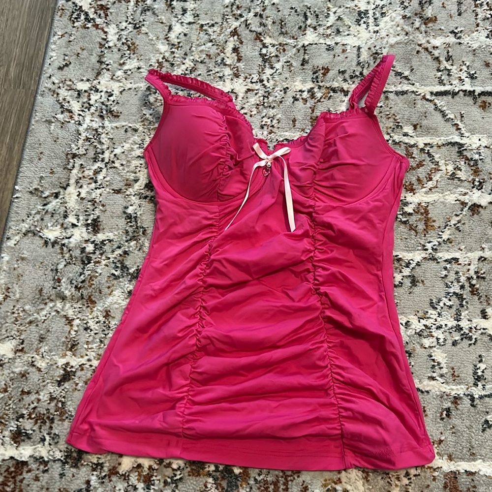 Hot pink Victoria’s Secret tank.
